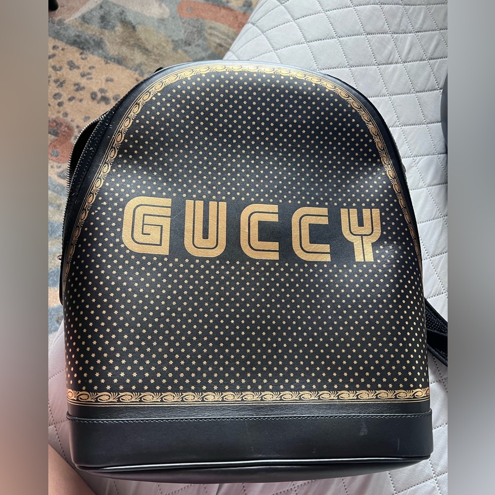 Gucci Black and Gold Logo Backpack